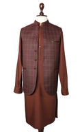 Men's brown check waistcoat over a matching traditional Pakistani shalwar kameez.