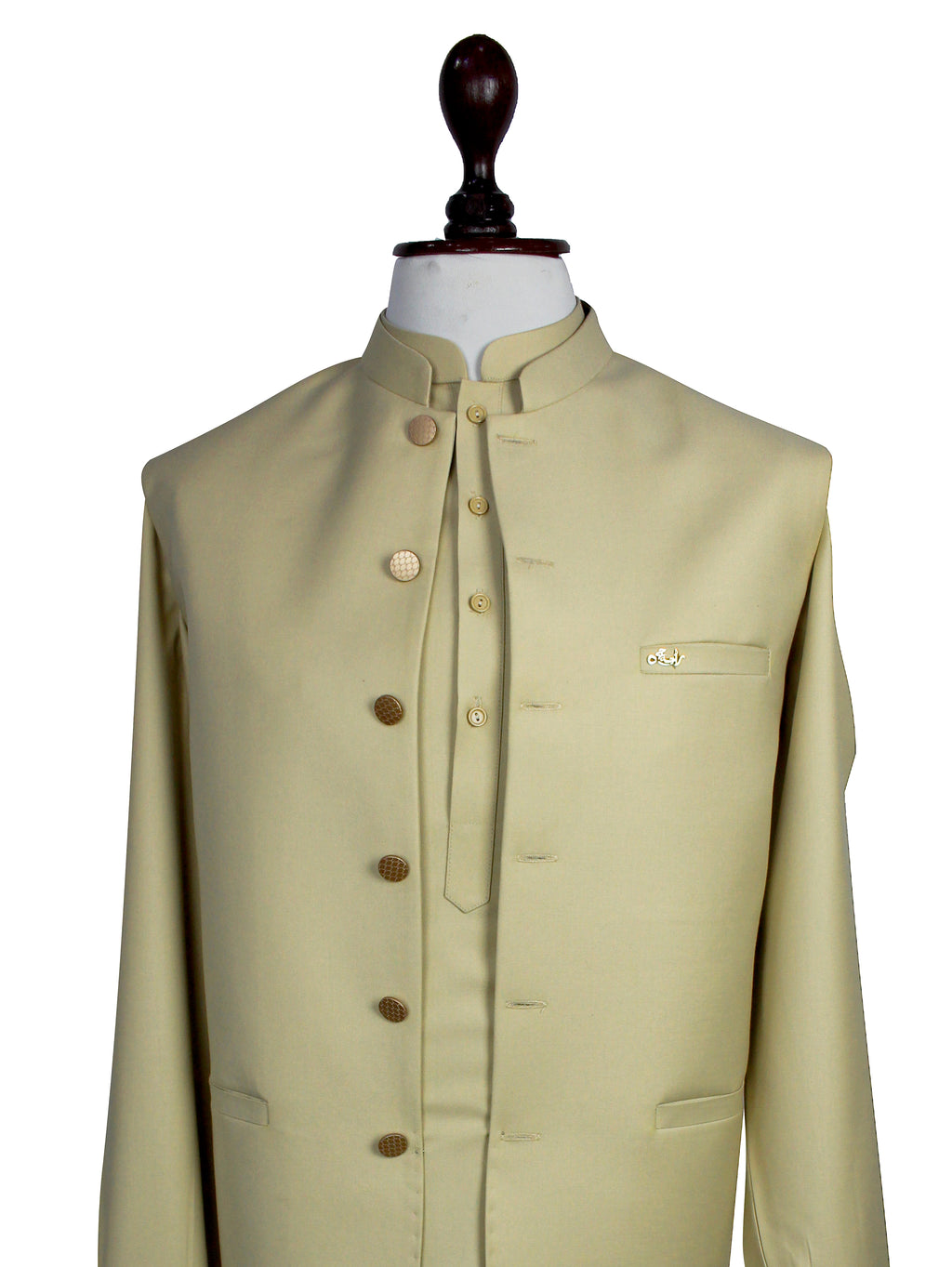 A light beige or cream-colored traditional Indian jacket (sharara suit jacket) displayed on a white mannequin torso with a dark wooden neck cap, set against a plain white background.