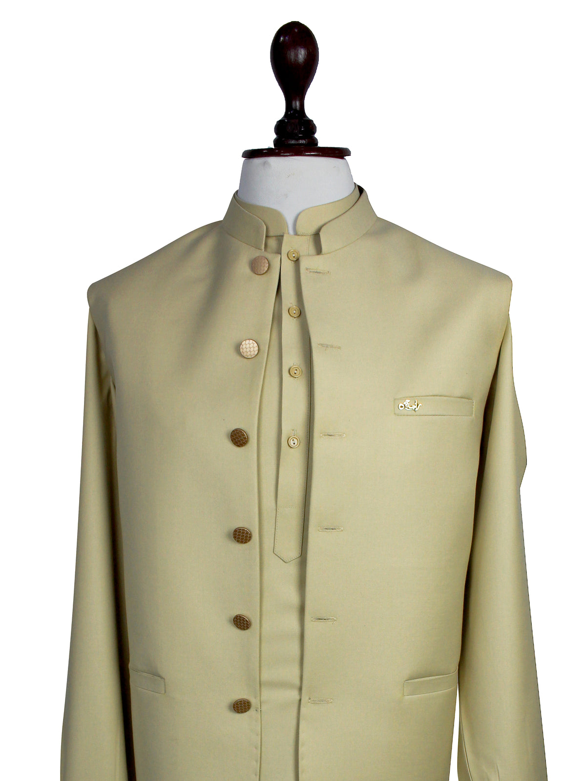 A light beige or cream-colored traditional Indian jacket (sharara suit jacket) displayed on a white mannequin torso with a dark wooden neck cap, set against a plain white background.