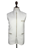 A white sleeveless vest displayed on a mannequin torso against a plain white background. The vest features a mandarin collar, a central front zipper, a zippered chest pocket, and two zippered lower pockets with gold-tone hardware.