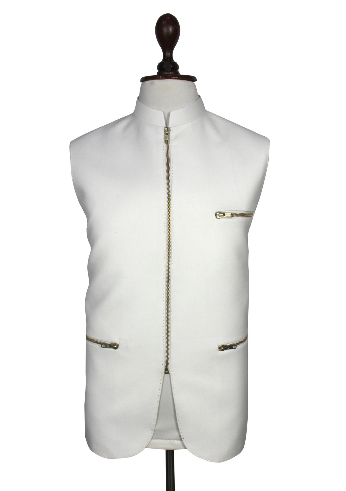 A white sleeveless vest displayed on a mannequin torso against a plain white background. The vest features a mandarin collar, a central front zipper, a zippered chest pocket, and two zippered lower pockets with gold-tone hardware.